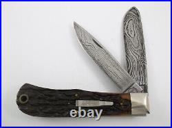 1997 Remington R1123-D Damascus Trapper Silver Bullet Knife