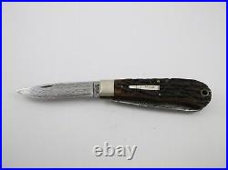 1997 Remington R1123-D Damascus Trapper Silver Bullet Knife