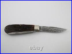 1997 Remington R1123-D Damascus Trapper Silver Bullet Knife