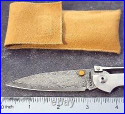 A. G. RUSSELL Knife One Hand Damascus Blade Smooth Stainless Steel Handles MINT
