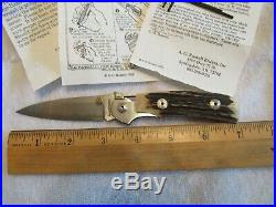 AG Russell Original Stag Damascus One handed Folding Knife. Unused. Excellent