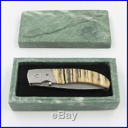 Browning Storm Front Damascus Folding Knife Mammoth Tool in it's Stone Case