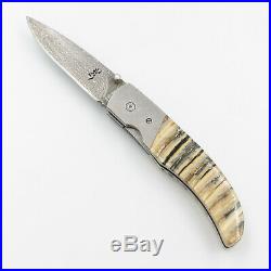 Browning Storm Front Damascus Folding Knife Mammoth Tool in it's Stone Case
