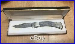 Buck 110 Folding Knife, Damascus Blade, Gray-bone scales, Velvet-lined Case