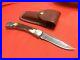 Buck-110-Folding-Knife-Stag-handles-Damascus-blade-circa-1989-new-case-01-wi