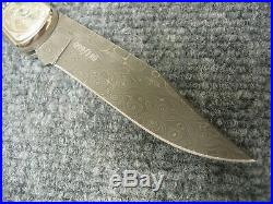 Buck 110 Paua Shell Damascus Nickel Engraved 2010 Limited Edition Folding Knife