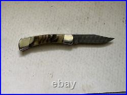 Buck 110 Stainless Damascus With Rams Horn Handles, 2008 From Buck Custom Shop