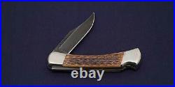 Buck Knife 110DB Folding Knife Damascus Blade Brown Bone Handle 1989