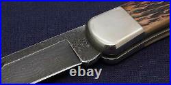 Buck Knife 110DB Folding Knife Damascus Blade Brown Bone Handle 1989