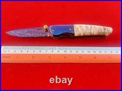 CUSTOM FOLDING KNIFE Blued Damascus STEEL Handmade Crafts Fossil Titanium RARE