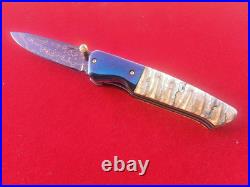 CUSTOM FOLDING KNIFE Blued Damascus STEEL Handmade Crafts Fossil Titanium RARE