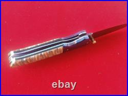 CUSTOM FOLDING KNIFE Blued Damascus STEEL Handmade Crafts Fossil Titanium RARE