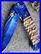 Custom-Folding-Knife-With-Gorgeous-Fossil-Mammoth-And-Blued-Damascus-01-by