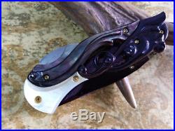 Custom Folding Knife by Suchat Jangtanong Damascus Steel Black White pearl carve