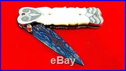 Custom Folding Knife by Suchat mosaic Damascus Steel White pearl carve handle