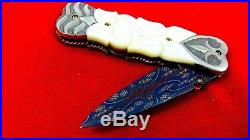 Custom Folding Knife by Suchat mosaic Damascus Steel White pearl carve handle