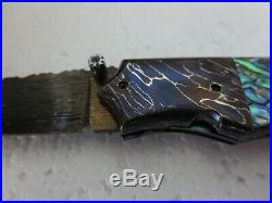 Custom folding pocket knife damascus blade and bolsters and abalone shell handle