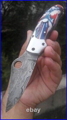 Custom handmade damascus steel hunting pocket folding knife with beautiful resin