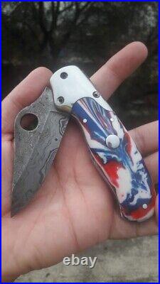 Custom handmade damascus steel hunting pocket folding knife with beautiful resin