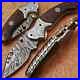 Damascus-Folding-Knife-with-sheath-micarta-handle-and-steel-engraved-bolsters-01-da