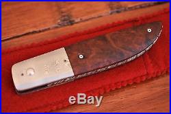 Folding R. L. Helton, San Diego, Tactical Knife with Damascus Blade, Wood grip