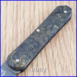 Fox Vulpis Folding Knife 2.13 Damascus Steel Blade Dark Matter Gold CF Handle