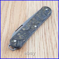 Fox Vulpis Folding Knife 2.13 Damascus Steel Blade Dark Matter Gold CF Handle
