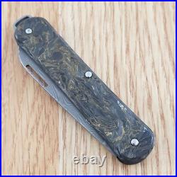 Fox Vulpis Folding Knife 2.13 Damascus Steel Blade Dark Matter Gold CF Handle