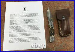 Grey Wolf Damascus Folding Knife In Leather Sheath
