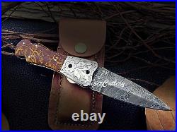 Hand forged Damascus folding knife Resin Brown sheet Engraved bolster pocket