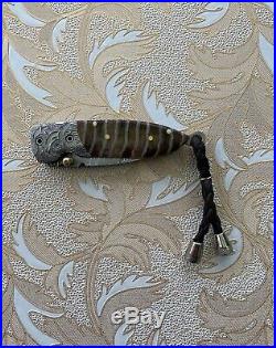 Handmade damascus steel folding blade knife (Wooly Mammoth Tooth Handle)