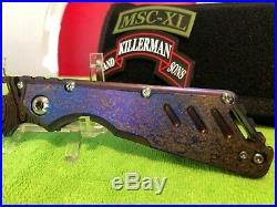 Mick Strider Custom XL Cobalt San Mai Damascus folding knife