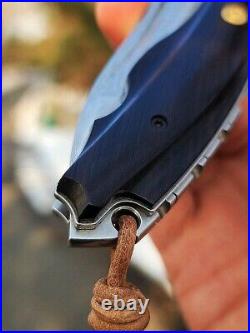 NEWOOTZ Exotic Japanese VG 10 Core Damascus Steel Ebony Handle Folding Knife