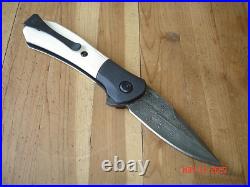 Nib Buck Knife 590 Ivsle Paradigm Bos Raindrop Damascus Blade G-10 Handles USA