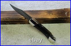 Parker Damascus blade lockback handmade in Japan. Never carried never sharpened