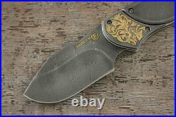 Premium Custom Author's folding Damascus knife decorated with gold Taiga