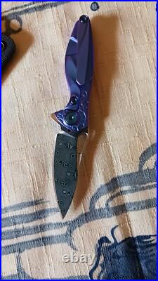 RIKE HUMMINGBIRD FOLDER- FLIPPER KNIFE with Damasteel blade and titanium handles