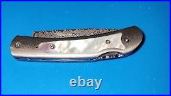 Santa Fe StoneworksDamascus Steel Frame Pocket Knife with Mother of Pearl