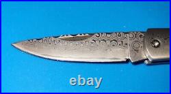 Santa Fe StoneworksDamascus Steel Frame Pocket Knife with Mother of Pearl