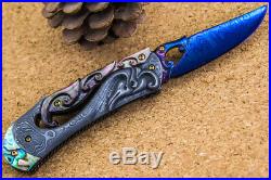 Suchat Jangtanong Custom Folding Knife Damascus Steel Carve as Swan inset Garnet