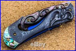 Suchat Jangtanong Custom Folding Knife Damascus Steel Carve as Swan inset Garnet