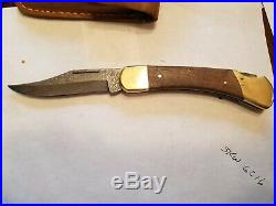 Vintage Buck 110 folding knife 3 pin Damascus 3 pin frames were first Buck110s