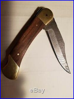 Vintage Buck 110 folding knife 3 pin Damascus 3 pin frames were first Buck110s