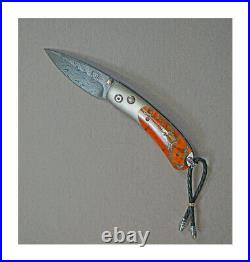 William Henry Handcrafted Folding Knife, B09 Glow, Titanium/Coral, Damascus