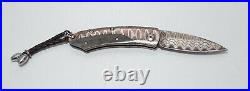 William Henry Pikatti B04-WMMC Folding Knife Copper Wave Damascus Steel